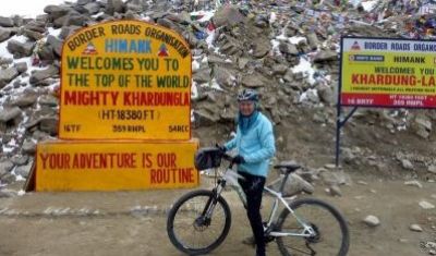 Dianne White Cycling on the  tour with redspokes